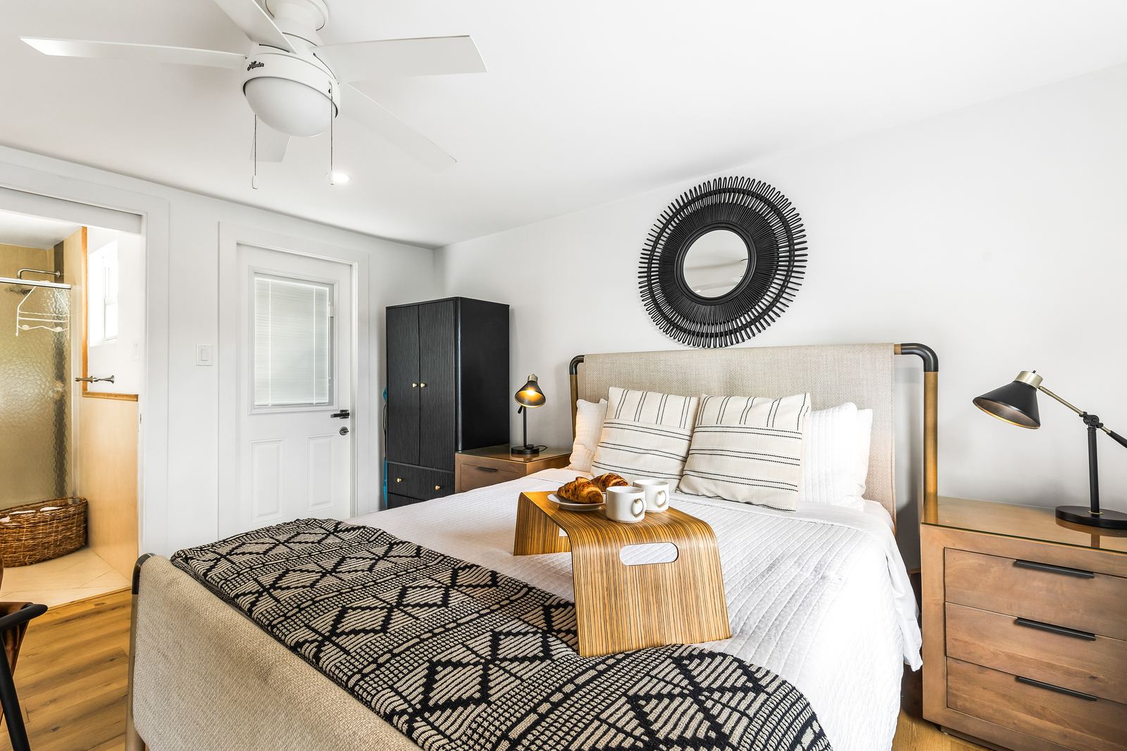 Queen bed with a breakfast tray — Evans Close 4, Palm Bay Getaways, Grand Cayman