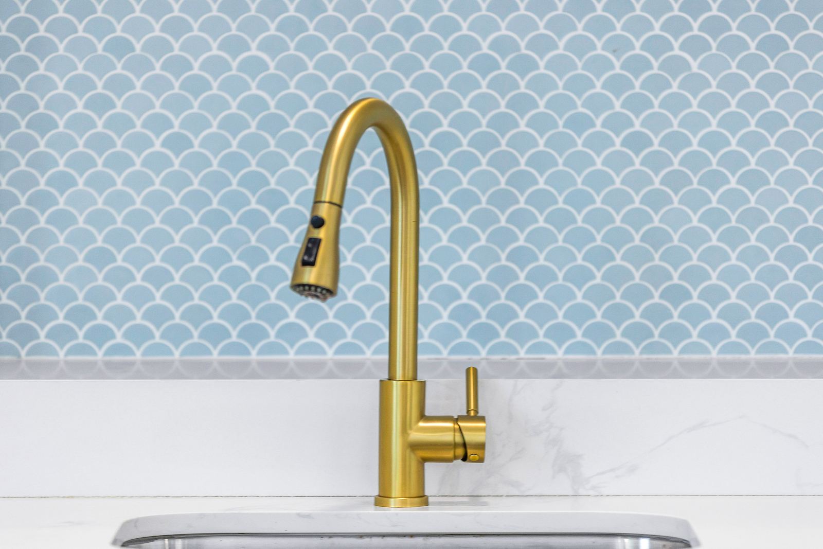 Brass tap and scallop tile — Evans Close 4, Palm Bay Getaways, Grand Cayman