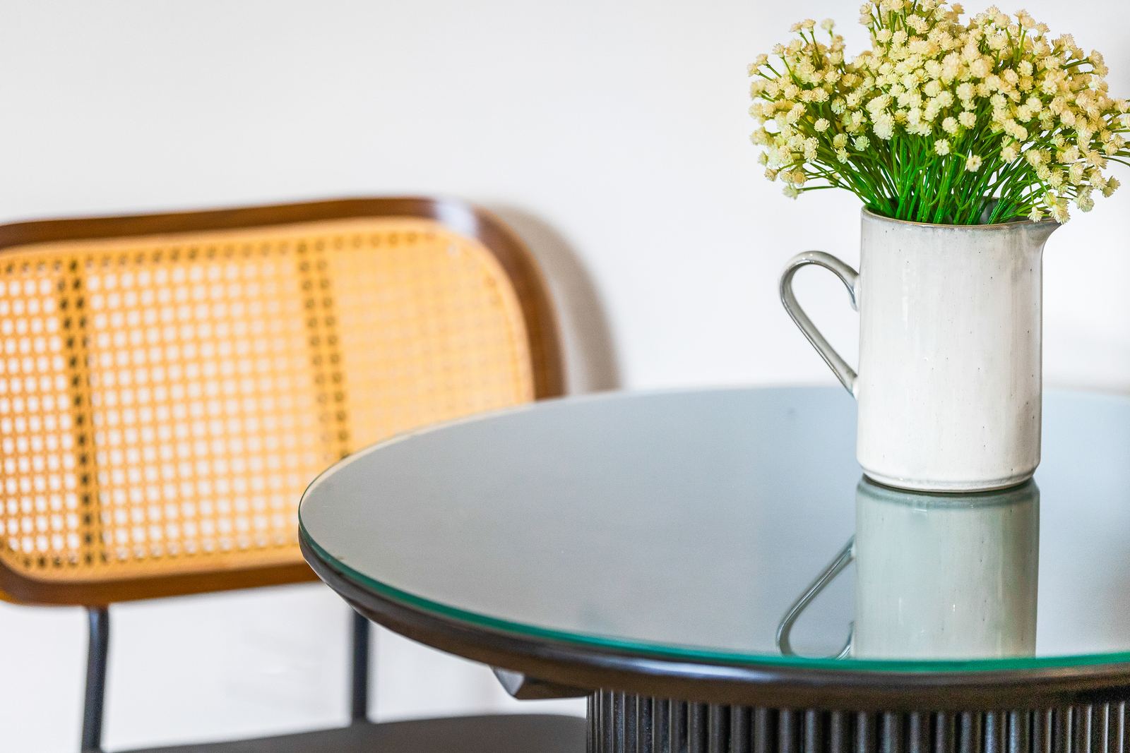 Cane chair and fresh flowers — Evans Close 4, Palm Bay Getaways, Grand Cayman